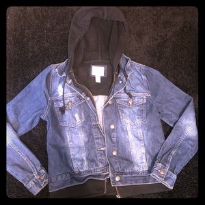 Blue jean jacket with hood.